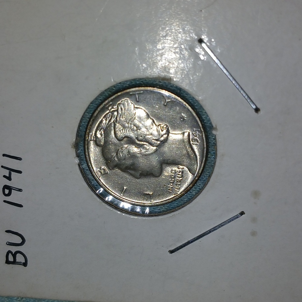 1941 mercury dime in pristine brilliant uncirculated condition.